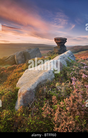 Gritstone Rock Formation known as 'The Salt Cellar' on Derwent Edge at sunset in The Derbyshire Peak District, UK Stock Photo