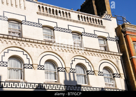 Black and white tile cladding to Langham Court Hotel frontage converted from one time nurses home Stock Photo