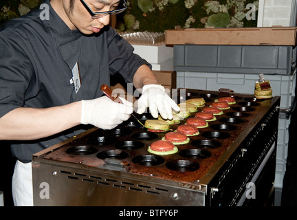 A chef preparing Tokyo Macaron Yaki, Salon du chocolate, Paris, 2010 Stock Photo