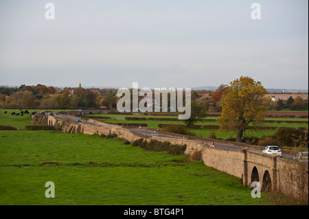 Swarkestone Road Bridge, Swarkestone, Derbyshire, England, UK. in Autumn evening sunlight. It is a very old bridge that crosses an area subject to flooding from the river. Stock Photo