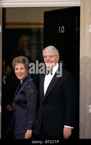 Former Prime Minister John Major and his wife Dame Norma Major arriving at number 10 Downing Street for Prime Ministers' Dinner. Stock Photo