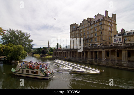 Horizontal view of tourists sitting in a pleasure boat on a guided tour through Bath city centre Stock Photo