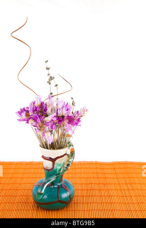 Vase with dry flowers isolated on white background. Stock Photo