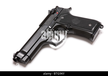U.S. Army modern handgun M9 close-up. Isolated on a white background. Tilt view. Studio shot. Weapon series. Stock Photo