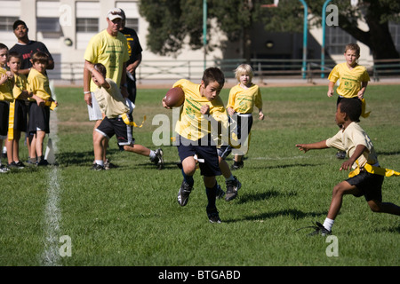 Young Boys Playing American Flag Football Stock Photo