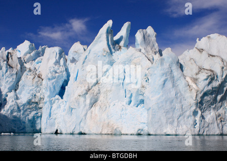 Icebergs and Glaciers are ever present in East Greenland Stock Photo