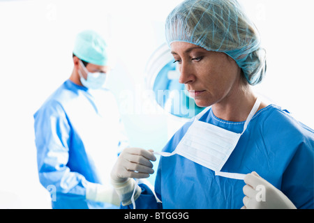 Medical personnel in operating room Stock Photo
