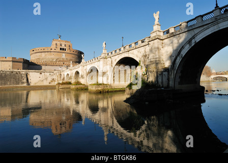 Rome. Italy. Castel Sant' Angelo & Bernini's baroque angels on Ponte Sant' Angelo. Stock Photo