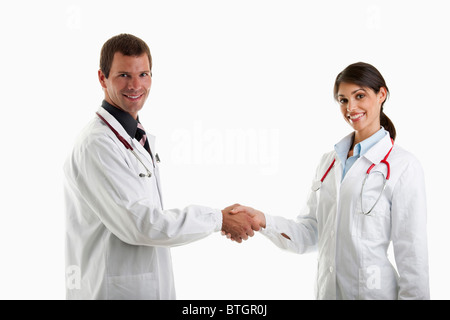 Two doctors shaking hands Stock Photo
