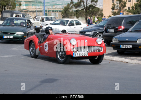 A Triumph TR 3A  takes part in a practice session for the Valletta Grand Prix for classic cars. Stock Photo