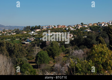 Country houses dotted on the hillsides, Near Alhaurin el Grande, Costa del Sol, Malaga Province, Andalucia, Spain, Europe. Stock Photo