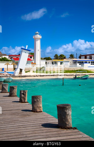 old tilted and new lighthouses in Puerto Morelos near Cancun, Quintana Roo, Mexico Stock Photo