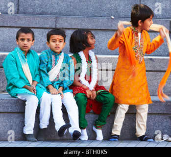 Children wait to dance to the music of Rabindranath Tagore during a festival to reintroduce his work to a UK audience Stock Photo