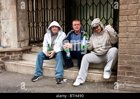 Three street drinkers doing what they do best Stock Photo