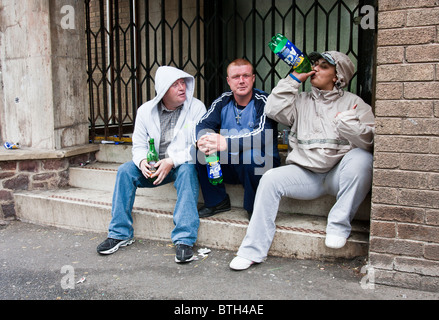 Three street drinkers doing what they do best Stock Photo