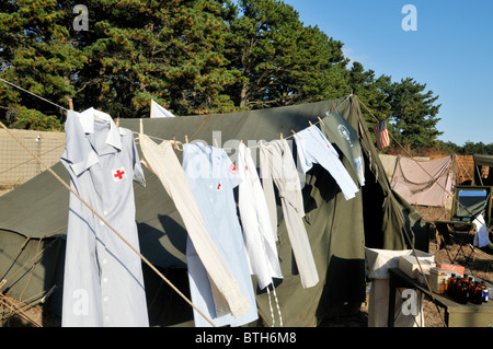 Laundry of nurses hanging outside of World War II First Aid Tent at a reenactment of WWII US military Camp at MMR Cape Cod. Stock Photo