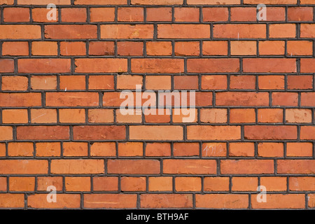 The facade view of the old brick wall for design background. Stock Photo