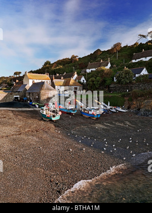 A late summer morning over Cornish fishing village, Cadgwith Cove on the Lizard Peninsula of Cornwall Stock Photo