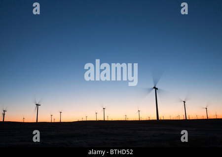 Dawn over Whitelee wind farm and visiter centre on Eaglesham Moor just south of Glasgow in Scotland, UK Stock Photo