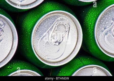 Closeup background of cans stacked up Stock Photo