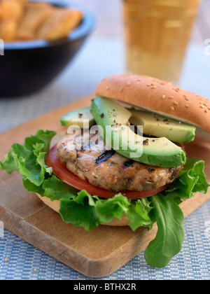 grilled chicken burger in bun Stock Photo