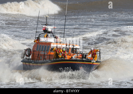 RNLI  Lifeboat serving at Cromer Norfolk. Rough seas, action shot,showing lifeboat working hard in tough conditions Stock Photo