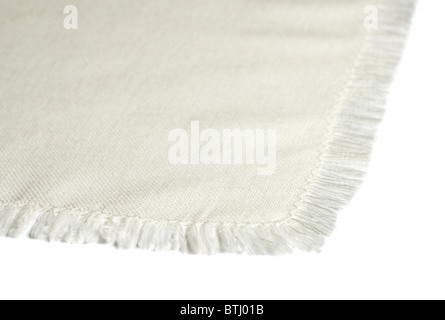 Close up of a white cotton napkin isolated on white background Stock Photo