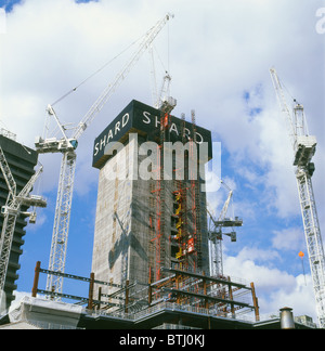 Cranes on the construction site of The Shard designed by Renzo Piano near London Bridge, South London UK 2010 KATHY DEWITT Stock Photo