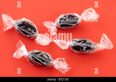 Pile of four Jakemans Throat and chest soothing menthol sweets Stock Photo