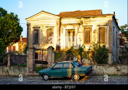 Greek house and Turkish car, Cunda Island, near Ayvalik, Turkey. Stock Photo
