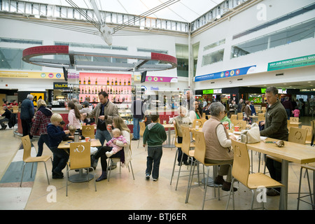 People waiting for their train through the Eurotunnel (Channel Tunnel); The England Terminal, Eurotunnel, Folkestone UK Stock Photo