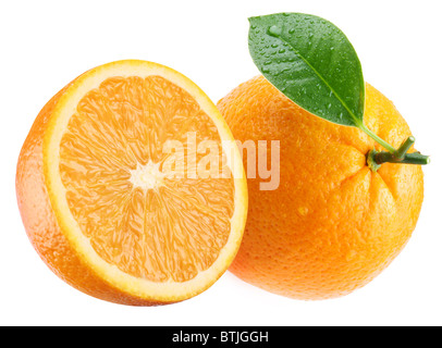Ripe orange and its half with leaf. Isolated on a white. Stock Photo