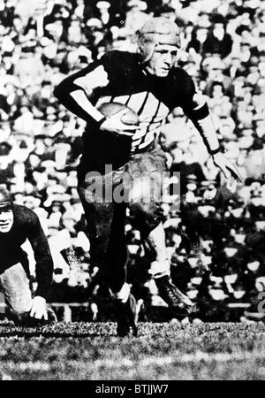 Harold 'Red' Grange as University of Illinois junior halfback, 1927.Courtesy: CSU Archives/Everett Collection Stock Photo