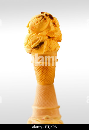 Traditional Cornish vanilla Ice cream chocolate ripple  scoops served cold in a wafer cone Stock Photo