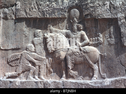 Triumph of Shapur I over Roman emperor Valerian, relief Iran Stock Photo