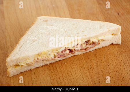 bacon and egg mayonaise triangle sandwich in white bread Stock Photo