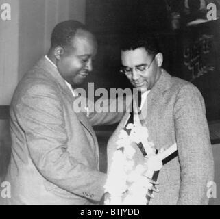 Richard Wright (1908-1960), African-American author of the best selling 1940 novel 'Native Son,'receiving the Spingarn Award from sociologist, Elmer Carter, in 1941. Stock Photo