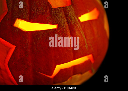 Carved Halloween pumpkin with an Iron Man inspired face Stock