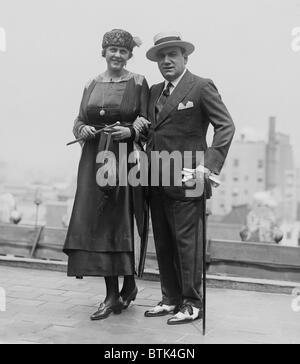 Enrico Caruso (1873-1921), with his new wife, the former Dorothy Park Benjamin (1893-1955), after their wedding in New York City. Caruso was twenty years older than his American wife. 1917. Stock Photo