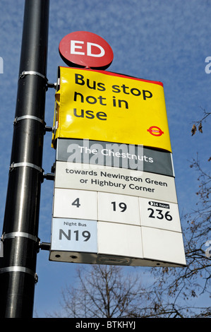 Bus stop not in use, sign above stop, Highbury London England UK Stock Photo