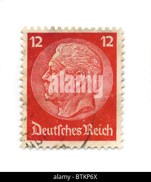 GERMANY - CIRCA 1934: An GERMANY Used Red Postage Stamp showing Portrait of Paul Ludwig Hans Anton von Beneckendorff und von Hindenburg, circa 1934. Stock Photo