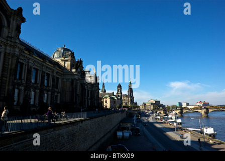 Bruhl's Terrace waterfront walkway along Elbe River busy with tourists pedestrians in historic old Dresden Stock Photo