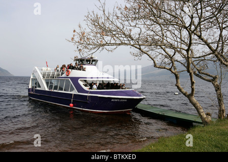 Cruise boat on Loch Ness in Scotland. Stock Photo