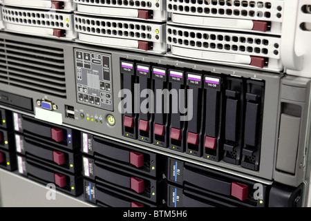 servers stack with hard drives in a datacenter for backup and data storage Stock Photo