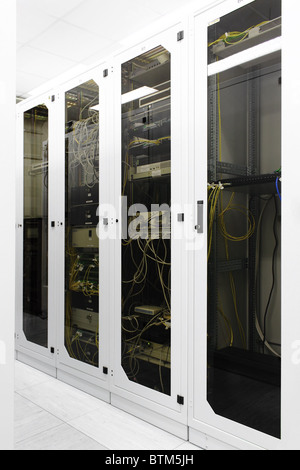 Racks with network equipment in technology telehouse room Stock Photo ...