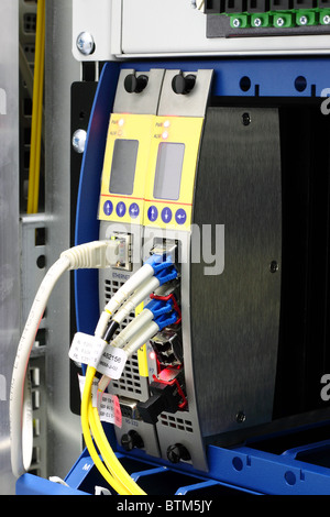 LightGAIN fiber optic wdm multiplexer mounted in rack with lc connector Stock Photo