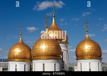 Golden domes of the Uspensky Sobor (Cathedral of the Dormition, or Cathedral of the Assumption). Kremlin, Moscow, Russia. Stock Photo