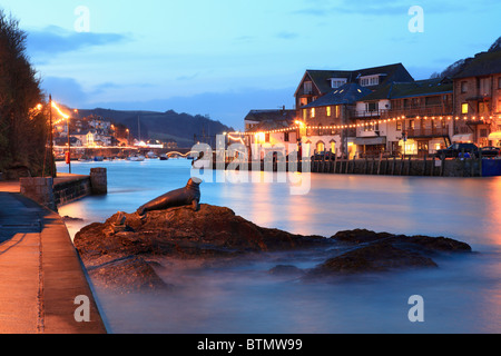 The statue of Nelson the Seal on the River Looe in south east Cornwall captured during twilight Stock Photo