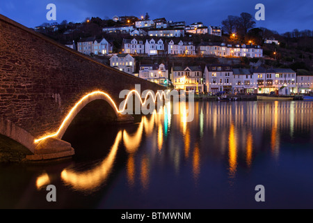 The road bridge across Looe River in south east Cornwall captured during twilight Stock Photo