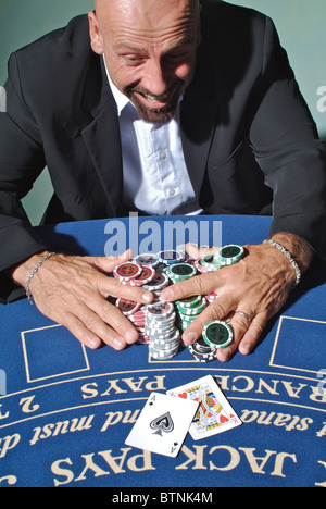 A man winning at gambling Stock Photo